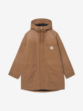 Tan cotton canvas parka with hood and front chest pocket, styled flat lay front view