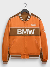 Kith BMW Souvenir Moto jacket orange front view studio shot