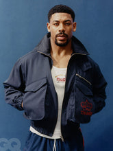 Aaron Pierre inspired navy cotton bomber jacket front view studio