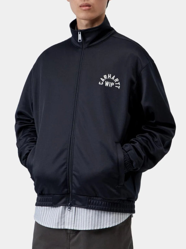 Navy zip-up fleece jacket styled with jeans, model front pose
