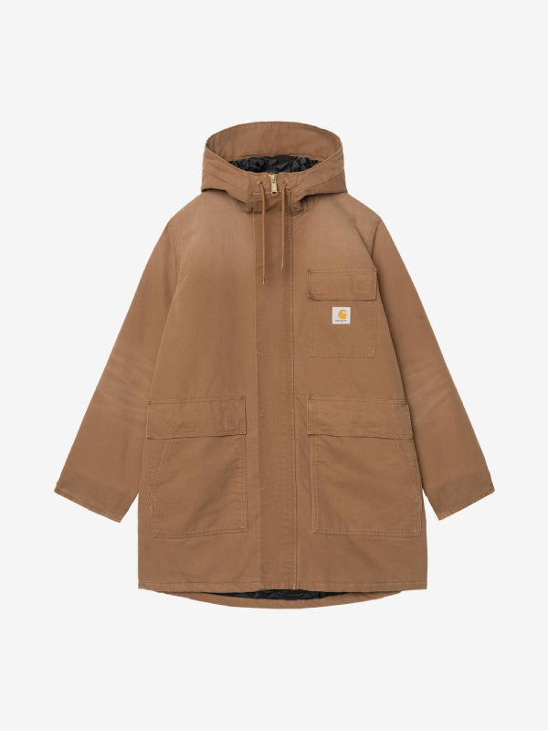 Tan cotton canvas parka with hood and front chest pocket, styled flat lay front view