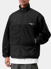 Stand collar jacket zipped up, model with hand in zippered pocket