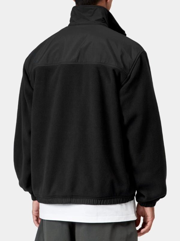 Parachute fabric paneled jacket back showing dropped shoulder seams and fleece body