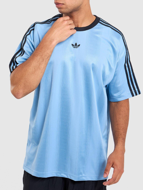 Outer Banks John B light blue trefoil jersey front view studio
