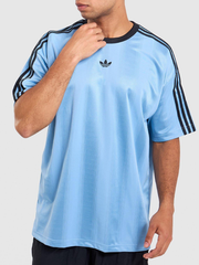 Outer Banks John B light blue trefoil jersey front view studio