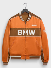 Kith BMW Souvenir Moto jacket orange front view studio shot