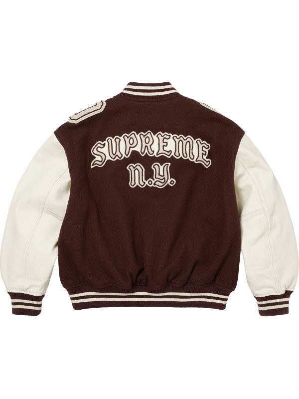 Brown Supreme Captain varsity jacket back view with cream SUPREME N.Y. lettering