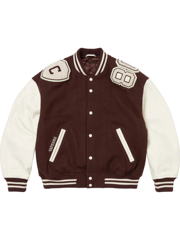 Brown Supreme Captain varsity jacket with cream sleeves and varsity shoulder patches