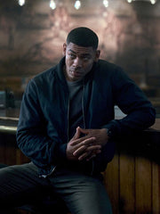 Lanterns John Stewart navy bomber jacket close up bar scene