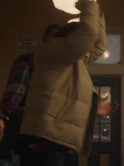 Spencer Gilpin Jumanji Open World beige puffer jacket side view indoor motion