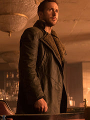 Ryan Gosling Officer K shearling collar coat close up front view bar scene