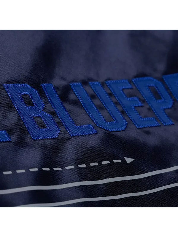 The-Blueprint text embroidery close up satin bomber jacket detail