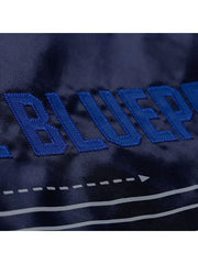 The-Blueprint text embroidery close up satin bomber jacket detail