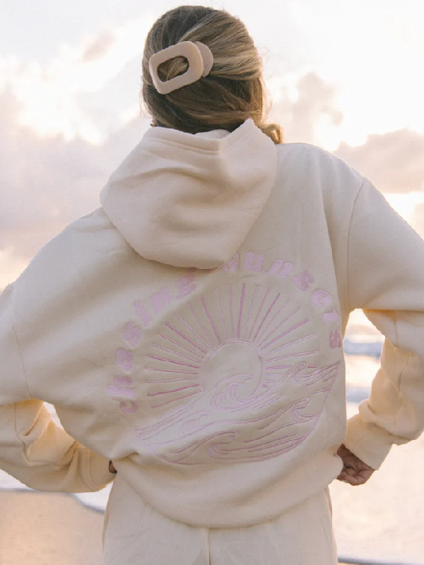 Ivory fleece sweatshirt with soft pink wave design