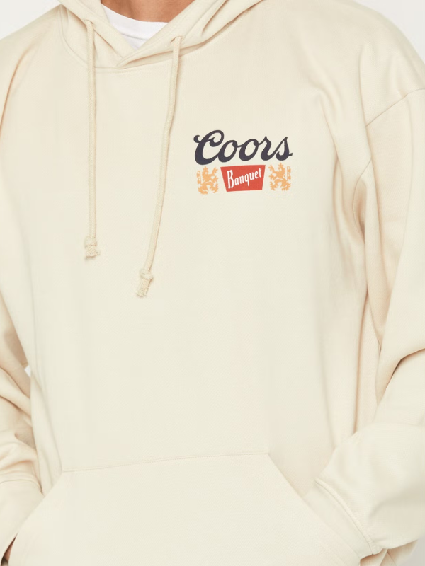 Coors Banquet chest logo close up cream hoodie