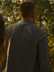 Outer Banks Rafe Cameron blue denim shirt back view outdoor