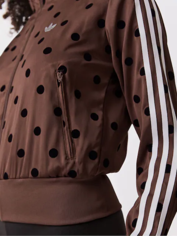 Brown polka dot track jacket close up zip pocket and sleeve stripes