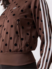 Brown polka dot track jacket close up zip pocket and sleeve stripes
