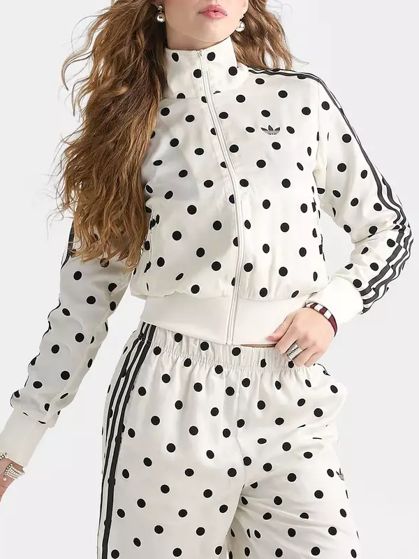 Cream polka dot track jacket with black stripes front view