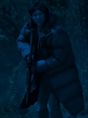Hig The Dog Stars Jacob Elordi gray puffer coat night scene rifle