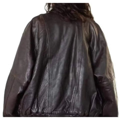 back view of oversized black leather jacket with relaxed fit, streetwear style