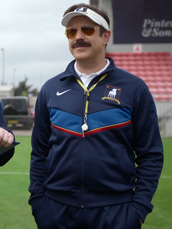 Ted Lasso Jason Sudeikis AFC Richmond blue tracksuit set front view football pitch
