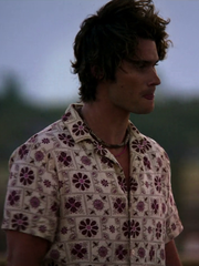 John B Outer Banks cream floral tile shirt side profile evening