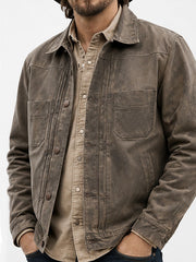 Luke Grimes Kayce Dutton brown leather trucker jacket close up front view