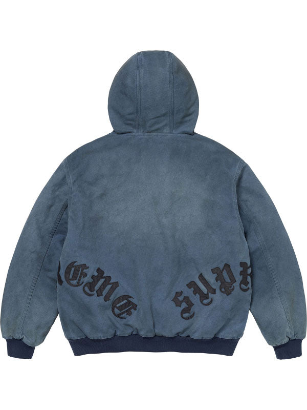 Blue washed cotton hooded jacket with plaid lining, leather appliqué details, front pockets, ribbed cuffs and hem.