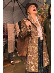 Loretta Durkin Only Murders floral tapestry coat close up front view umbrella