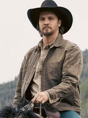 Kayce Dutton Yellowstone Marshals brown leather jacket front view horseback scene
