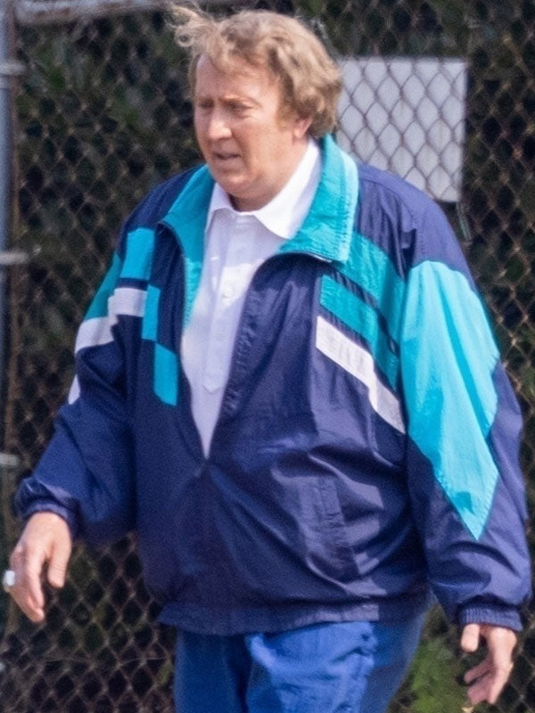 Nicolas Cage Madden movie navy teal colorblock track jacket front view outdoor