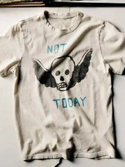Outer Banks Not Today winged skull graphic t-shirt flat lay