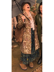 Loretta Durkin Only Murders floral tapestry coat front view full body outdoor
