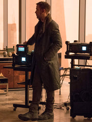 Ryan Gosling Blade Runner 2049 Officer K coat side view dim office lighting