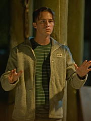 Rafe Cameron Outer Banks grey fleece jacket front view indoor