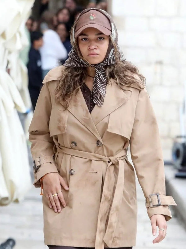 Madison Bailey Kie Outer Banks belted trench coat walking scene
