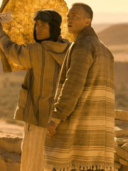 Outer Banks Rafe Cameron striped wool coat back view desert scene