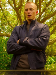 Rafe Cameron Outer Banks navy cotton jacket front view outdoor