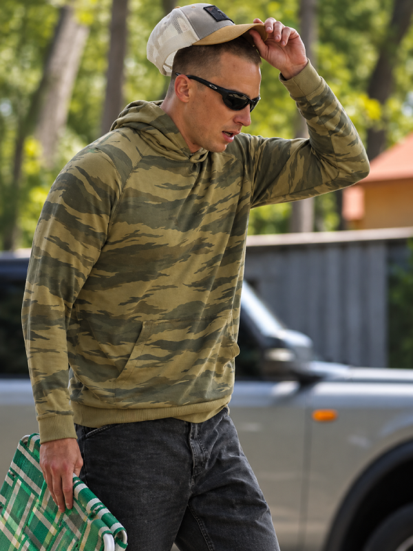 Rafe Cameron Outer Banks camo hoodie front view outdoor scene