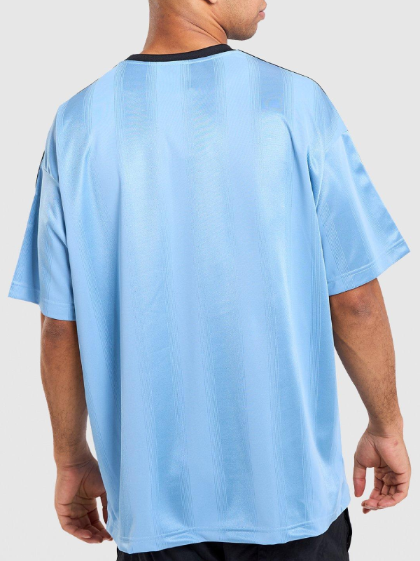 Outer Banks John B light blue trefoil jersey back view studio