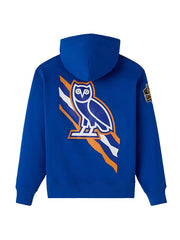 OVO X New York Knicks blue fleece hoodie featuring an owl-inspired graphic design on the back