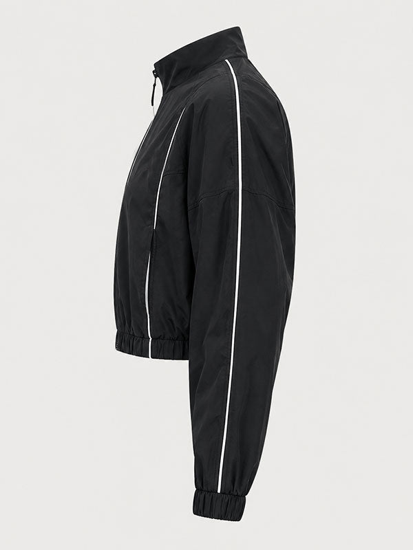 Perry Mattfeld Ricky track jacket side profile view