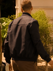 Rafe Cameron Outer Banks navy jacket back view outdoor scene