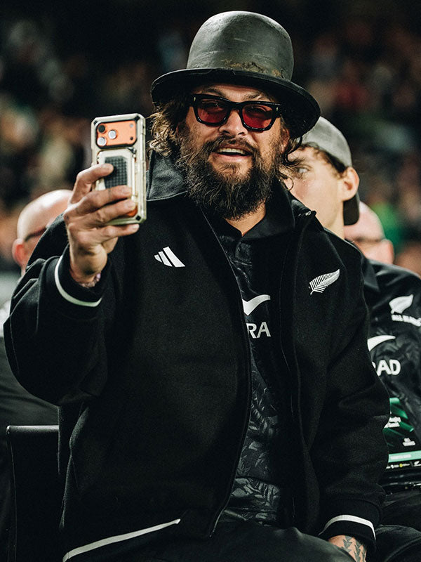 Jason Momoa inspired black wool bomber jacket close up front view stadium