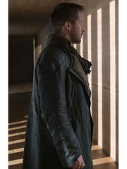 Ryan Gosling Officer K shearling collar coat side profile hallway light