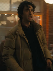Spencer Gilpin Jumanji Open World beige puffer jacket front view dim lighting