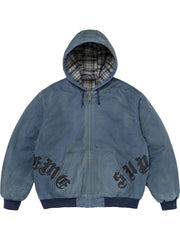 Blue washed cotton hooded jacket shown from the front, featuring plaid lining, zip closure, leather appliqué details and ribbed trim.