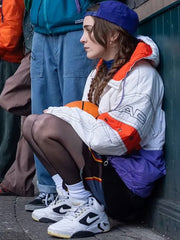 Paige 4 Kids Walk Into a Bank Talia Ryder jacket side view crouching scene
