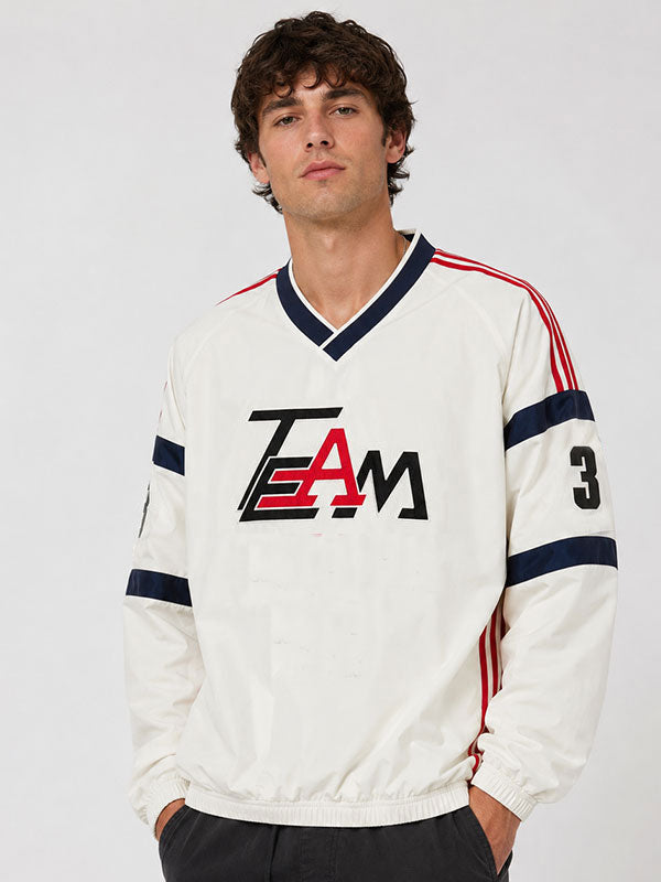 Men's oversized TEAM beige pullover front view V-neck close up